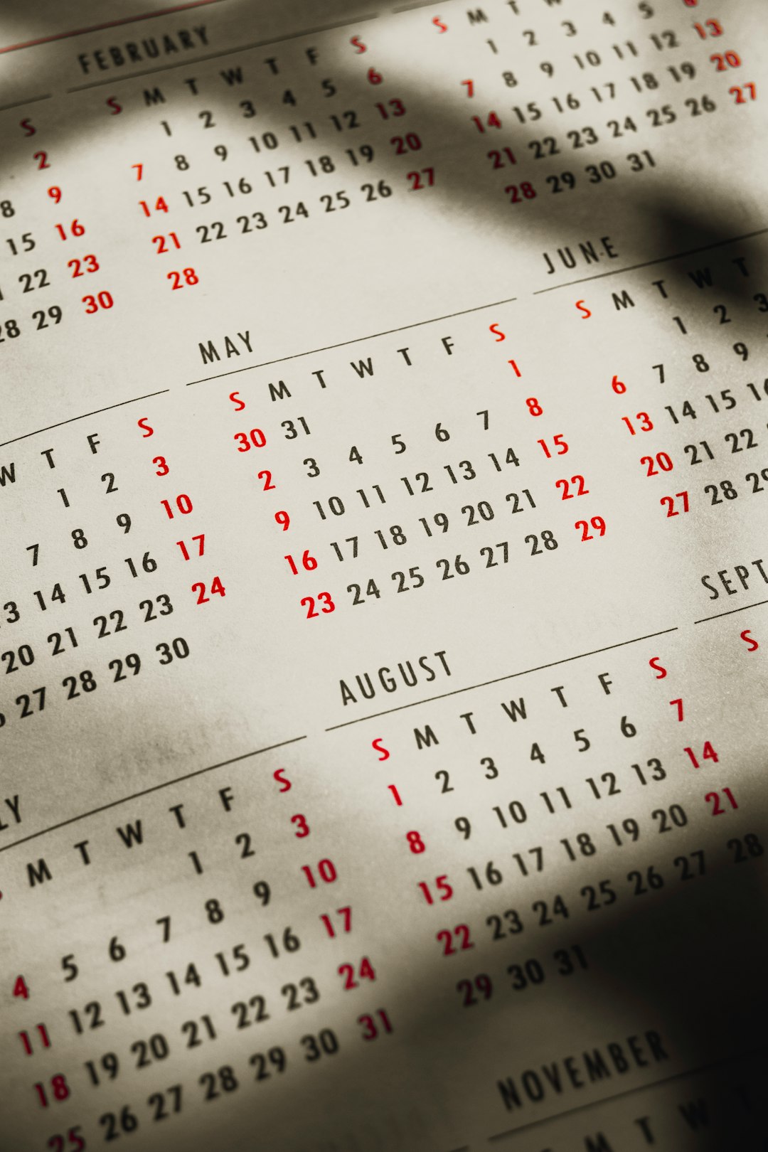a-close-up-of-a-calendar-on-a-table-r1cdf8hxgjy