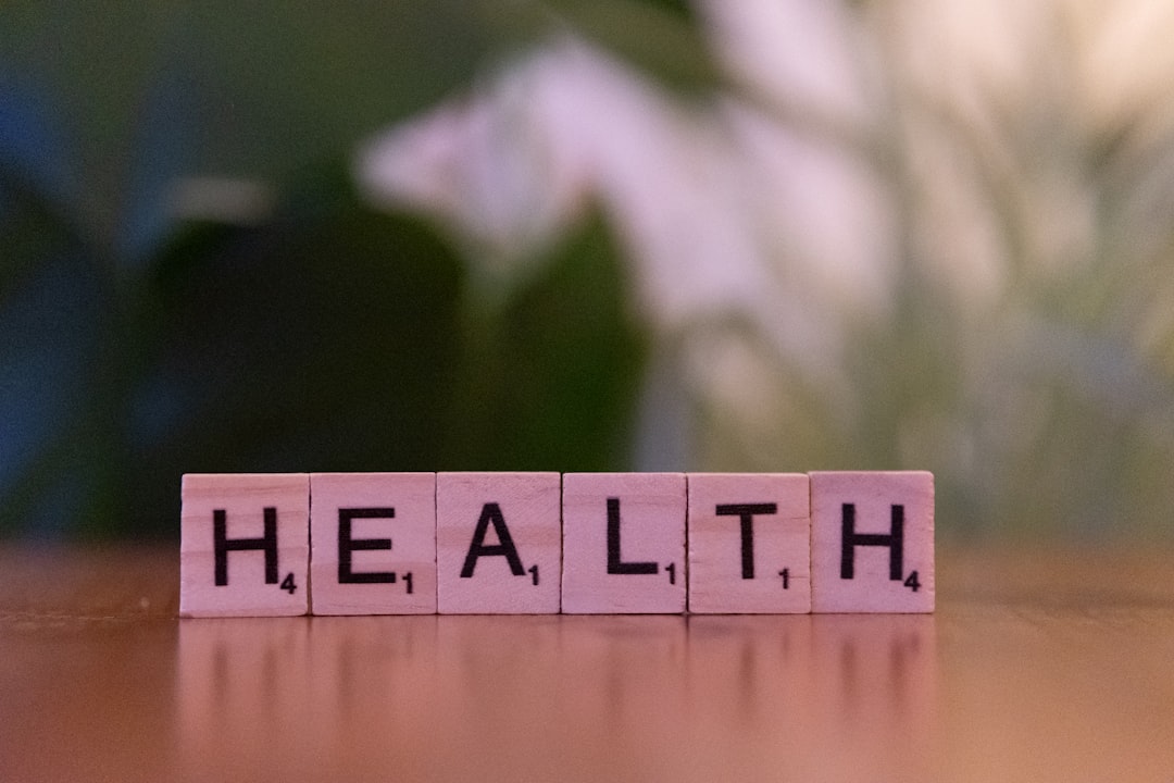 a-wooden-block-spelling-the-word-health-on-a-table-wgu0svpz-4